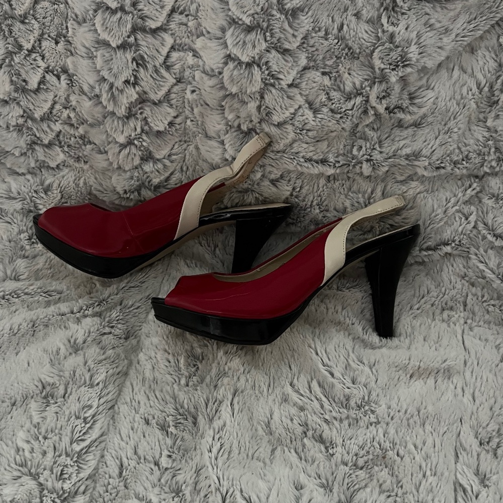 Sling black peep toe multi color heels.